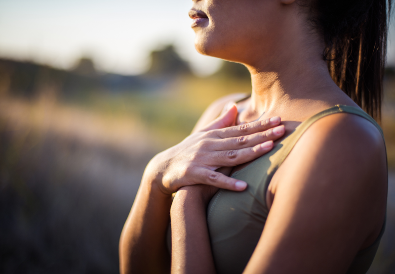 Woman taking deep breath